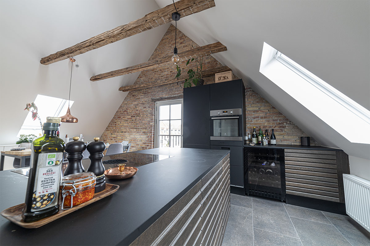 Renovated loft with exposed wooden beams
