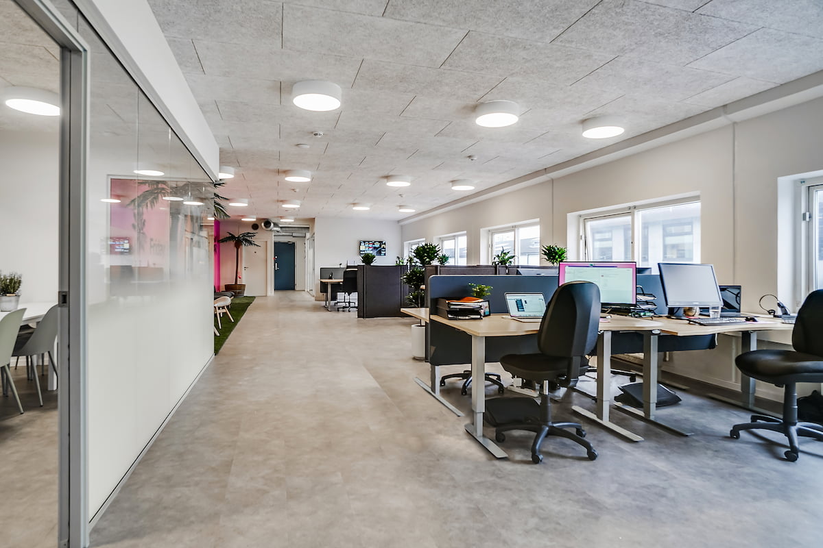 Bright open-plan office space owned by Simpson Capital